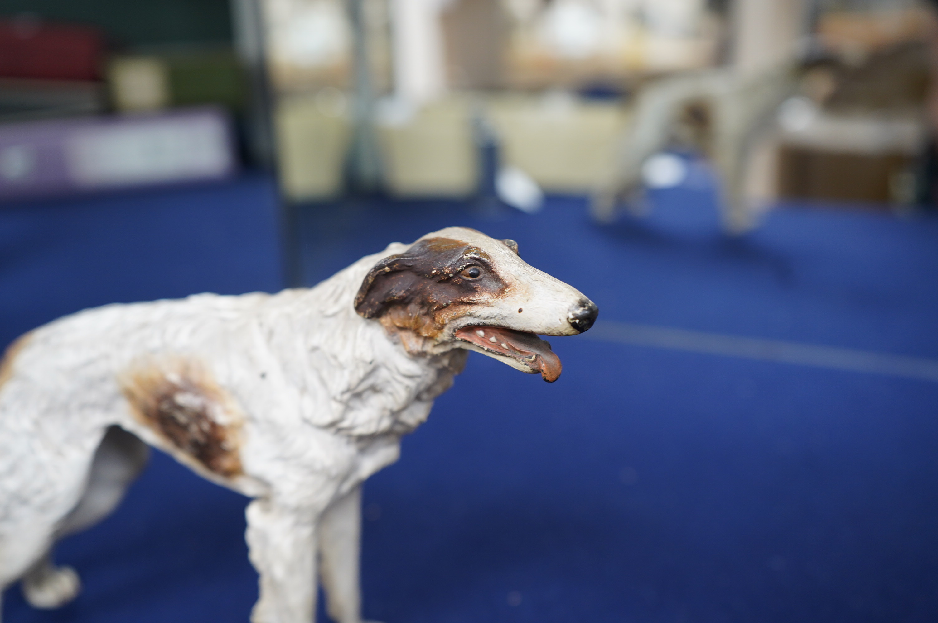 An Austrian cold painted bronze model of a borzoi, 24cm and a guinea pig, 4cm. Condition fair to good, minor chipping to paintwork.